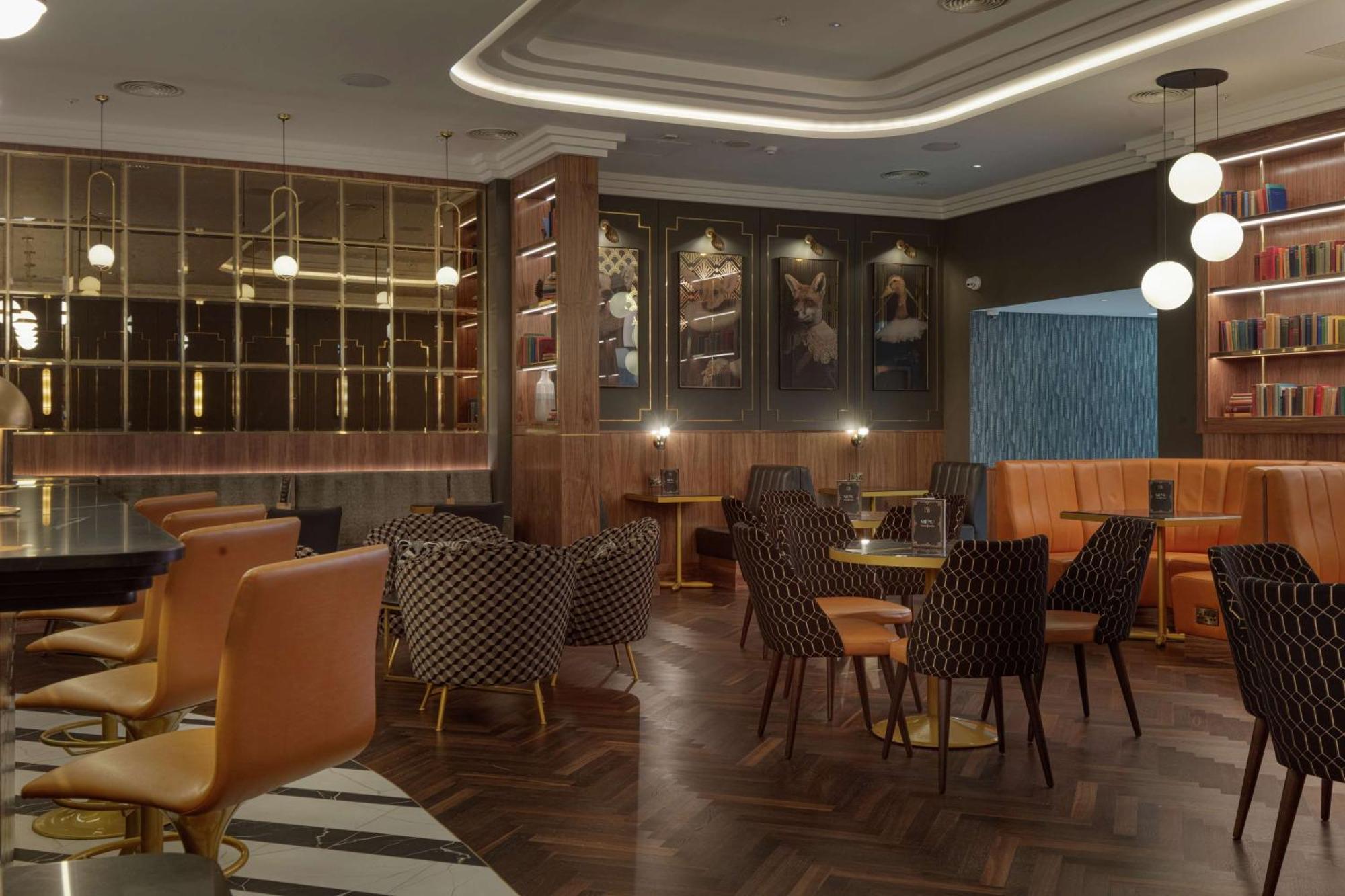 โรงแรมฮิลตัน เบลฟาสท์ เบลฟาสต์ ภายนอก รูปภาพ The interior of the restaurant